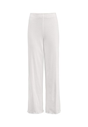 Pantaloni bianchi a gamba larga realizzati in un tessuto testurizzato con motivo a righe verticali, vita elastica e dettagli con orlo strappato.