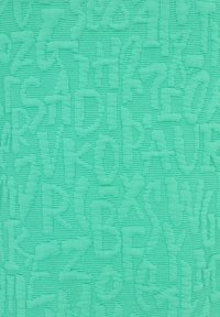 Textured fabric in light turquoise featuring an embossed pattern of uppercase letters, evenly distributed across the surface.