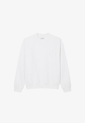 Witte longsleeve trui met ronde hals, geribbelde manchetten en zoom, voorzien van een klein borstzakje en een merkembleem aan de binnenkant van de halslijn.