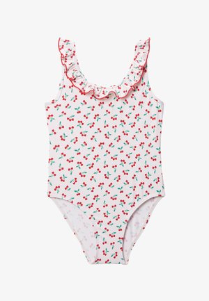 Maillot de bain une pièce blanc avec motif cerises rouges et encolure à volants bordée de rouge.