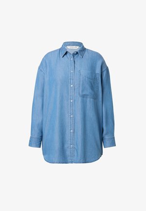 Lyseblå denimskjorte med knaplukning foran, spidse krave og enkelt brystlomme. Har lange ærmer og en afslappet pasform.