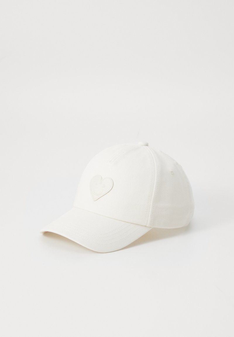 White cotton baseball cap with an embroidered heart design on the front, featuring a curved brim and stitched accents.