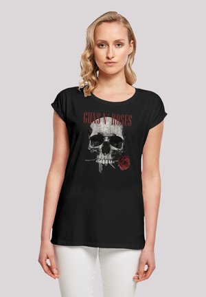 Black short-sleeve T-shirt featuring a graphic of a skull with a rose and "GUNS N' ROSES" text in red, made of soft fabric with a relaxed fit.