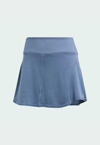 Helle blaue Sportskirt mit hohem Bund, aus strukturierter Stoff bestehend. Verfügt über ein ausgestelltes Design und dezente Nähtdetails.