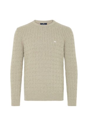 Lys beige teksturert genser med ribbestrikket mønster, rund hals og lange ermer. Liten logodetalj på brystet.