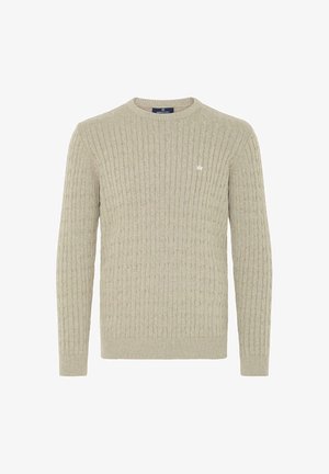 Világos bézs színű, struktúrált pulóver bordázott mintával, kerek nyakkal és hosszú ujjal. Kis logós részlet a mellen.