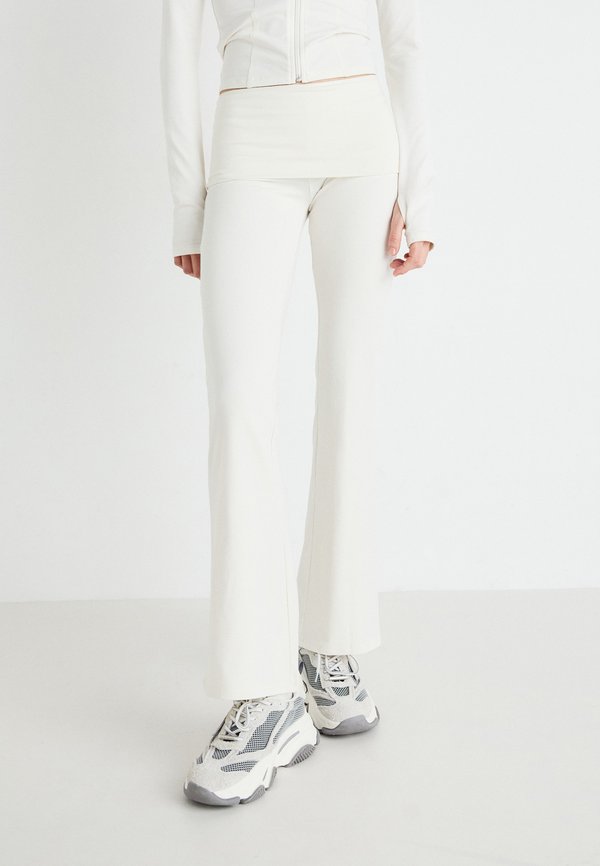 SOFT TOUCH FOLDED FLARE TROUSERS - Trousers - tofu