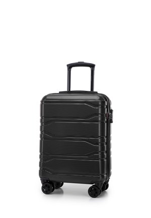 Black hard-shell suitcase with textured surface, multiple grooves, retractable handle, and four wheels for mobility.