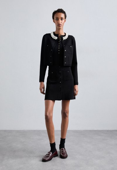sandro JUPE TRAPEZE POCHES  - Falda acampanada - noir