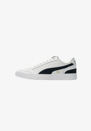 White leather sneakers with navy accents, textured finish, round toe, and flat white rubber sole. Features gold logo and lace-up design.