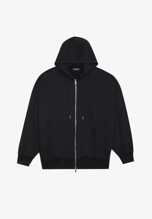 Črna zip-up kapuca iz mehkega materiala. Ima kapuco na vrvico, sprednje žepe in rebraste manšete. Preprost, minimalističen dizajn.