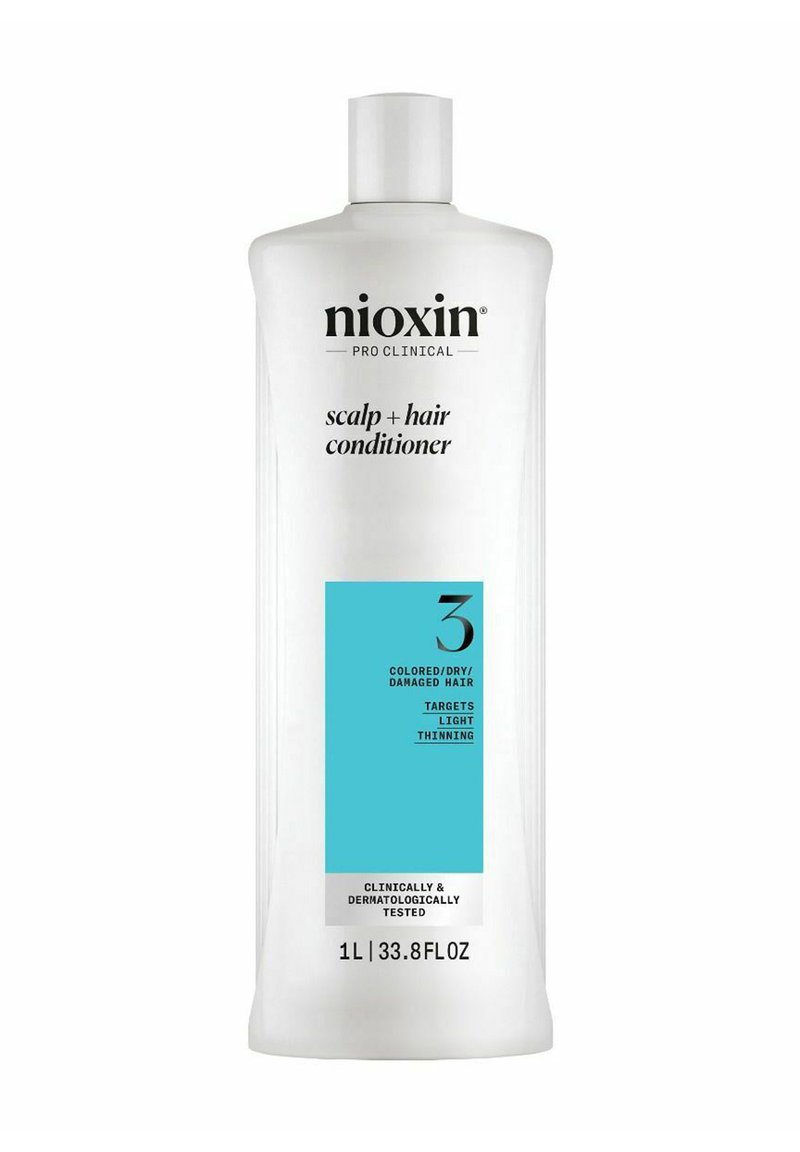 Nioxin Pro Clinical Kopfhaut- und Haarspülung, weißer Flasche, blauer Etikett mit Produktdetails, 1 Liter Kapazität, klinisch getestet.