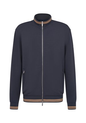 Marineblauer Zip-Jacken mit hohem Kragen, kontrastierenden beige gestreiften Akzenten an den Ärmeln und dem Saum, aus glattem Stoff gefertigt und mit Seitentaschen ausgestattet.