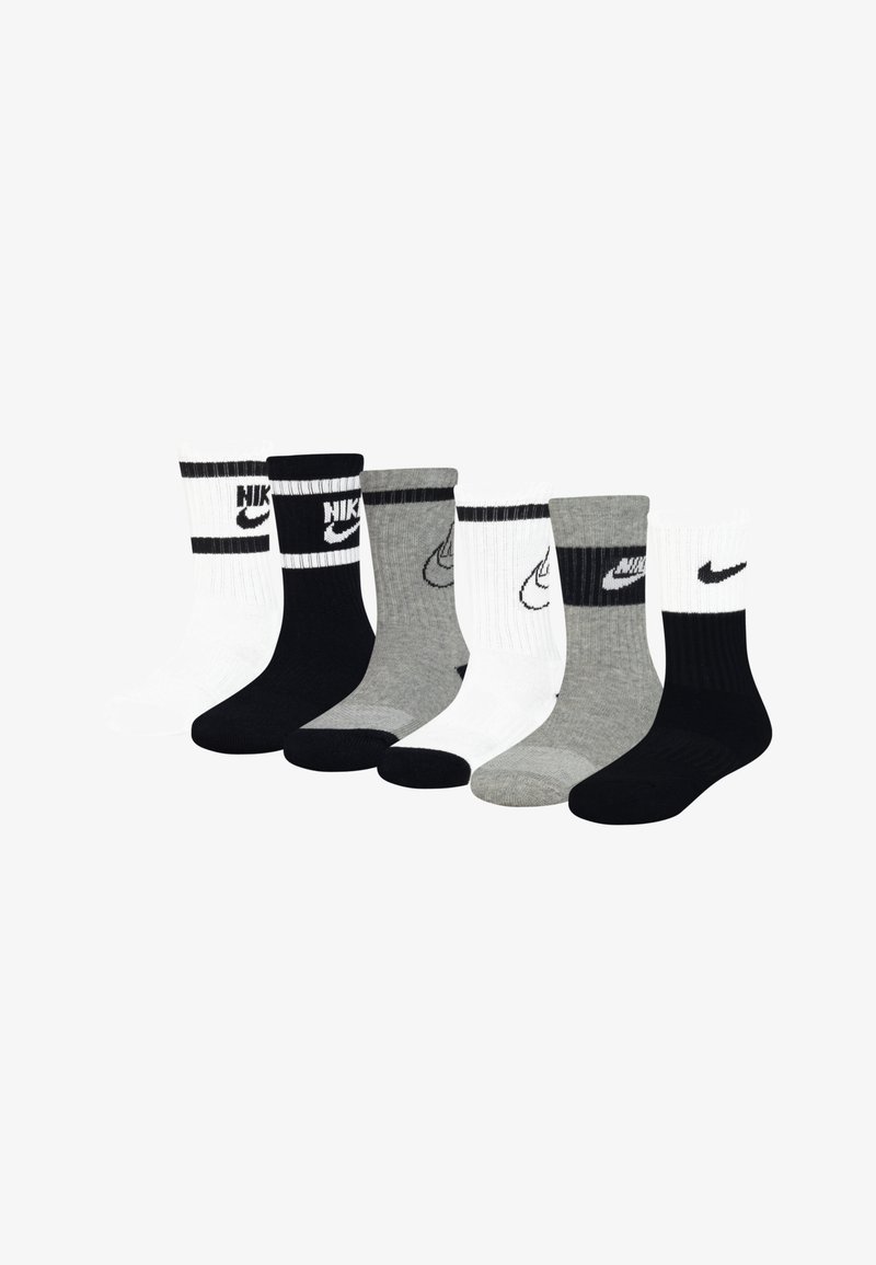 Seis pares de meias de comprimento de tripulação em branco, preto e cinza, com punhos canelados e logótipos da Nike em cores contrastantes.