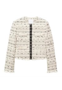 Veste courte en tweed crème et noir avec manches longues, encolure ronde, bordure noire à l'avant avec fermetures à crochets argentés, et bords à franges.