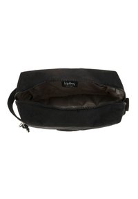 Sort Kipling-pung med en glat tekstur, lynlåslukning og et lille håndtag. Indvendigt er det mørkt med Kipling-logoet synligt.