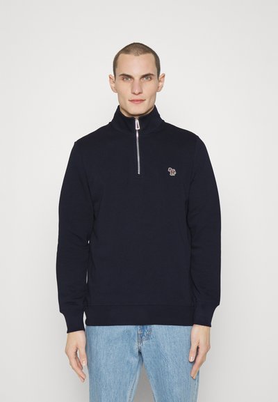 Dunkelblauer Half-Zip-Pullover aus weichem Stoff, mit kleinem Logo auf der Brust und gerippten Bündchen und Saum. Lässiger Stil.