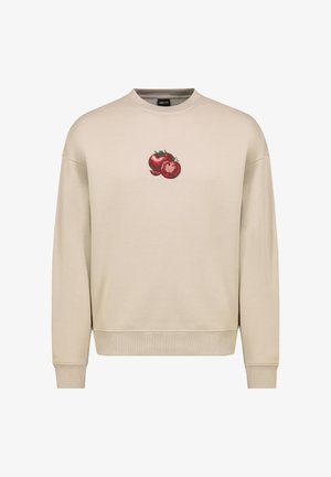 Beige crewneck sweatshirt made of soft fabric featuring an embroidered design of two red tomatoes on the front.