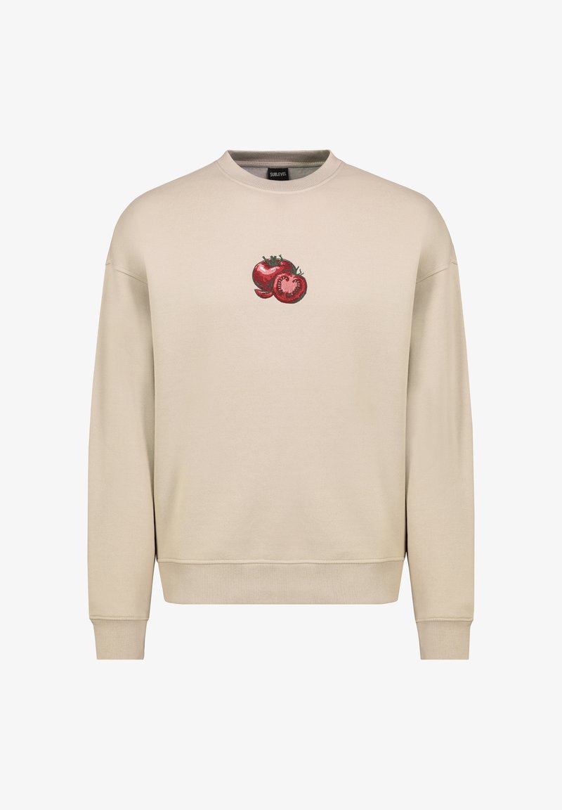 Beige crewneck sweatshirt made of soft fabric featuring an embroidered design of two red tomatoes on the front.