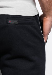 Ombre JOGGERS OM-PASK - Jogginghose - black