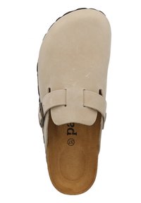 Beige suede slip-on shoe with a rounded toe, two strap details, and a brown textured sole; features a cushioned insole with logo.