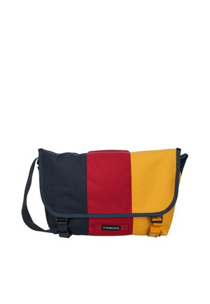 Shoulder bag with navy blue, red, and yellow vertical stripes, black trim, front buckles, and adjustable shoulder strap.