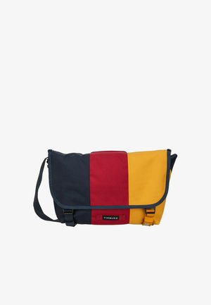 Umhängetasche mit vertikalen Streifen in Marineblau, Rot und Gelb, schwarzer Umrandung, vorderen Schnallen und verstellbarem Schulterriemen.