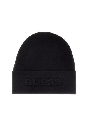 Bonnet en tricot noir avec un dessus arrondi et un revers replié, arborant un logo "GUESS" en relief à l'avant. Texture douce, design simple.