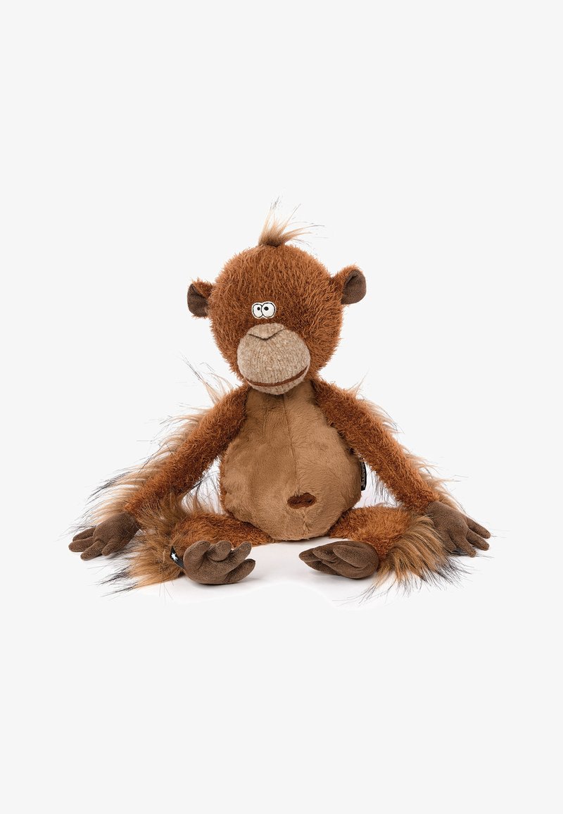 Jouet singe en peluche marron avec de longs bras et jambes, toupet de cheveux sur la tête, assis avec les membres écartés sur un fond blanc.