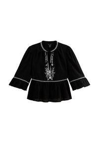 Blusa nera con maniche svasate, orlo arricciato e ricami floreali bianchi. Presenta una chiusura a nodo al collo e un tessuto testurizzato.