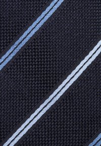Navy textile with a woven texture, featuring two diagonal light blue stripes. The material is sturdy and fabric-like.