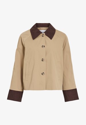 Beige kort jakke med mørk brun kordfløyelskrage og mansjetter, fire knapper foran og to sidelommer.