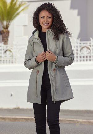 Light green, zip-up jacket with a hood, drawstring waist, and side pockets. Smooth material with a soft inner lining.