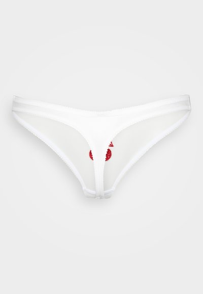Balts stringa veida apakšveļa ar caurspīdīgu audumu, centrā ar sarkanu izšūtu dizainu. Mīksta elastīga josta un viļņotas maliņas.