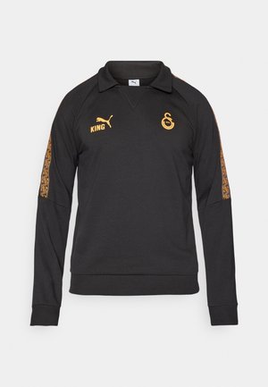 Jersey negro de manga larga con cuello, con logotipos naranjas y detalles estampados en las mangas. Fabricado en una tela texturizada.