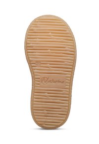 Suola in gomma di una scarpa per bambini con scanalature orizzontali, taglia 21, e logo del marchio Naturino impresso al centro.