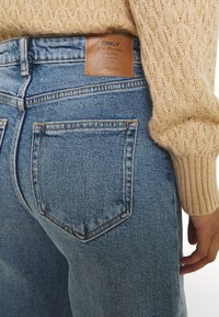 ONLY ONLJUICY WIDE LEG - Wide leg - medium blue denim