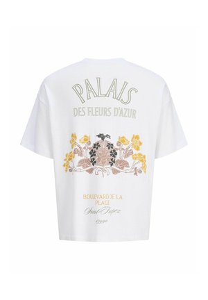 Hvid T-shirt med korte ærmer med blomsterdesign og tekst, der siger "Palais des Fleurs d'Azur" og "Boulevard de la Plage Saint-Tropez" på bagsiden.
