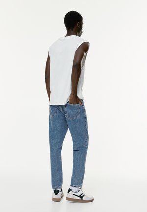 - Jeansy Straight Leg
