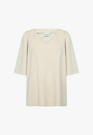 Blouse de couleur crème avec un col en V, manches courtes, coutures d'épaule légèrement froncées et une coupe ample, confectionnée dans un tissu doux et lisse.