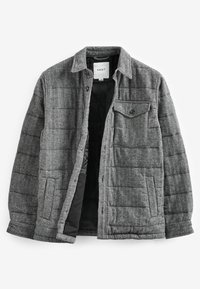 Grå herringbone pufferjakke med knapkrave, quiltet mønster og en brystlomme. Har sort foring og trykknapper.