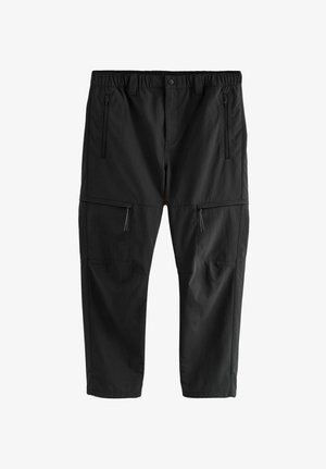 Juodos lengvos medžiagos kelnės su elastiniu liemens juostele, dviem užtrauktukais užsegamomis šoninėmis kišenėmis ir dviem užtrauktukais užsegamomis kišenėmis krovinio stiliumi. Lygi tekstūra ir tiesus kirpimas.