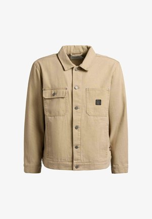Beige knappbar jakke med to brystlommer, en med klaff og knapp, og en liten svart firkantet logo på høyre lomme.