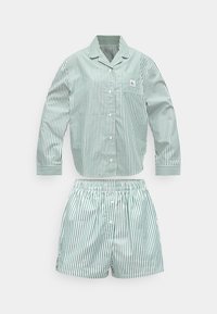 Langærmet, grøn og hvid stribet pyjamasskjorte med knapper og brystlomme samt matchende shorts med elastik i taljen.