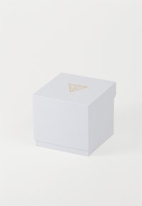 White textured gift box with a gold triangle logo on top, featuring a magnetic closure and a square shape.