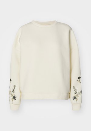 Gräddfärgad sweatshirt gjord av mjukt tyg, med blommig broderi på ärmarna och en klassisk rundhalsdesign.