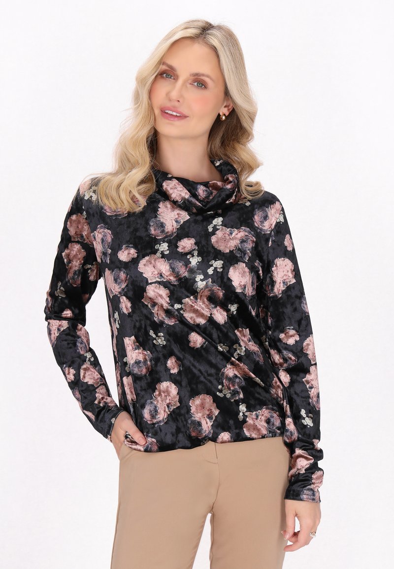 Maglia a collo alto, maniche lunghe, realizzata in morbido tessuto nero con un motivo floreale in tonalità di rosa e verde, caratterizzata da una vestibilità comoda.