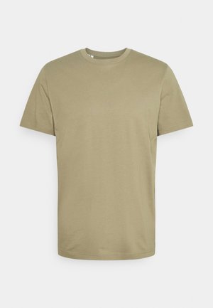 Olijfgroene t-shirt met korte mouwen, gemaakt van zachte katoen. Crew neck ontwerp met een soepele textuur en zonder zichtbare versieringen of patronen.