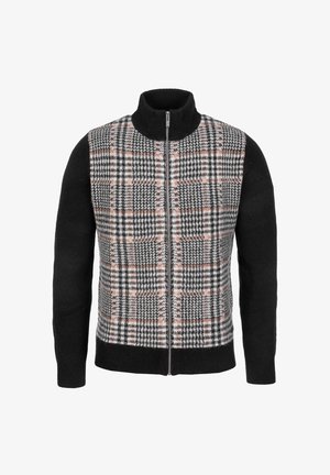 Suéter de punto negro con cremallera completa, cuello alto y panel frontal con patrón de cuadros pata de gallo en negro, blanco y rosa.