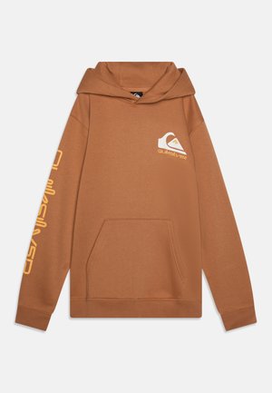 Brown pullover hoodie made of soft fabric, featuring a front pocket, a large logo on the chest, and vertical text on the sleeve in yellow.